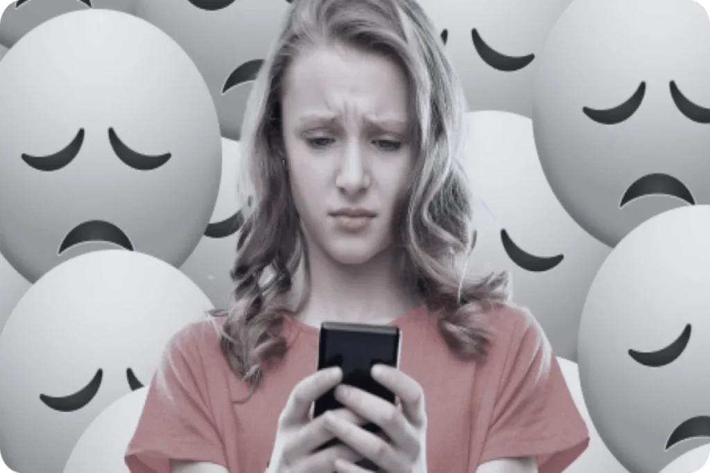 Teen turning phone away from parent showing loss of trust caused by unhealthy phone monitoring